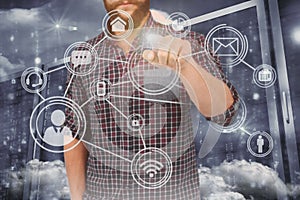 Composite image of mid section of man pointing