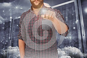 Composite image of mid section of man pointing