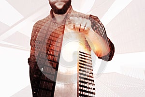 Composite image of mid section of man pointing