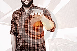 Composite image of mid section of man pointing