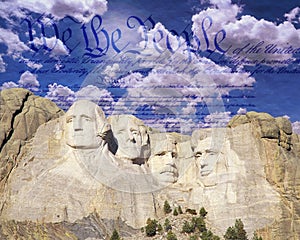 Composite image of Mount Rushmore, U.S. Constitution, and blue sky with white clouds