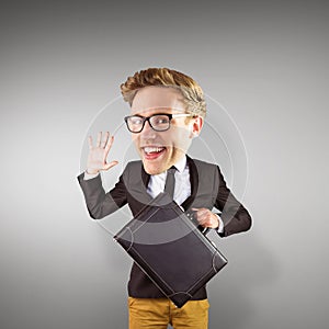 Composite image of nerd smiling and waving