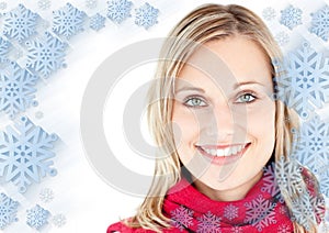 Composite image of portrait of a beautiful woman with a red scarf smiling at the camera
