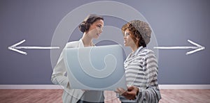 Composite image of portrait of businesswomen posing with laptop