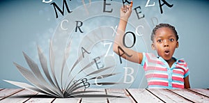 Composite image of portrait of cute schoolgirl with hand raised