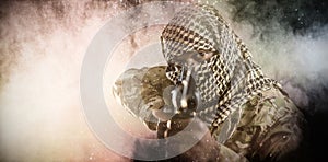 Composite image of portrait of face covered soldier aiming with rifle