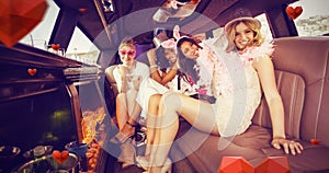 Composite image of portrait of female friends in limousine