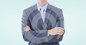 Composite image of portrait of smiling businessman standing hands folded