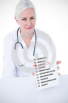 Composite image of portrait of smiling female doctor showing notepad
