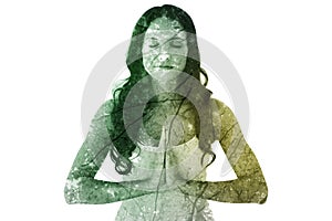 Composite image of pretty brunette doing yoga