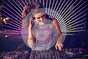 Composite image of pretty female dj playing music