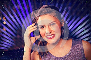 Composite image of pretty female dj playing music