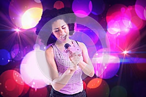 Composite image of pretty girl singing