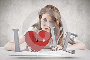 Composite image of pretty redhead typing on keyboard