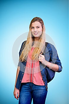 Composite image of pretty student in the library