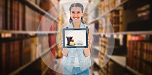 Composite image of pretty student showing her tablet pc