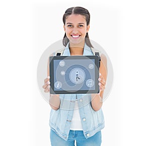 Composite image of pretty student showing her tablet pc