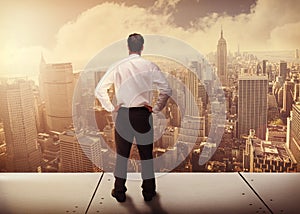 Composite image of rear view of classy young businessman posing