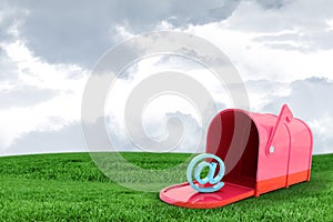 Composite image of red email post box