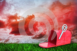Composite image of red email post box