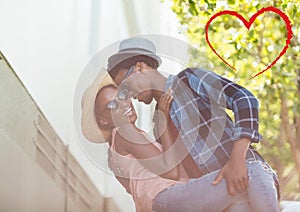 Composite image of red heart and couple dancing on holidays