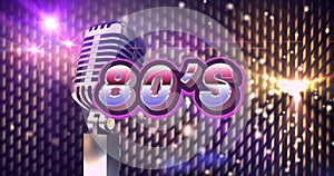 Composite image of retro microphone with 80\'s against illuminated background
