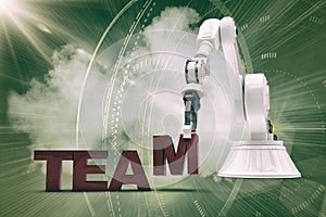 Composite image of robotic arm arranging team text 3d