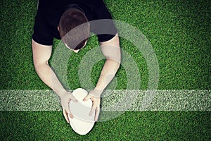 Composite image of a rugby player scoring a try