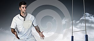 Composite image of rugby player taking position