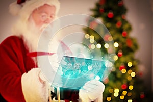 Composite image of santa checking his list