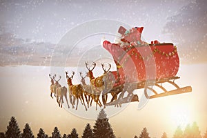 Composite image of santa claus riding on sleigh with gift box