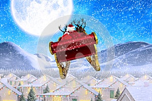 Composite image of santa flying his sleigh