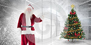 Composite image of santa shows something to camera