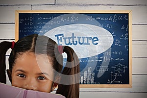 Composite image of schoolgirl covering mouth with book