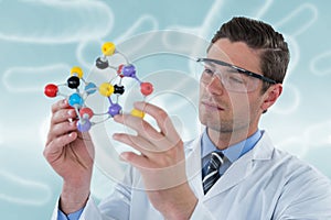 Composite image of scientist experimenting molecule structure 3d