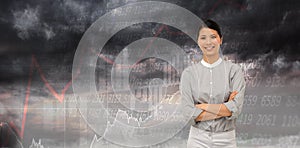 Composite image of selfassured businesswoman with folded arms