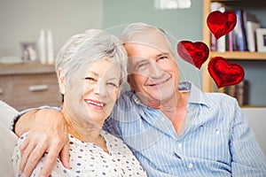 Composite image of senior couple and valentines hearts 3d