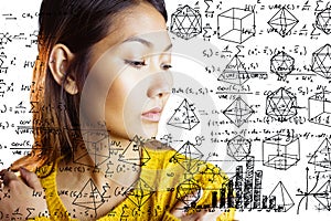 Composite image of serious asian woman looking down