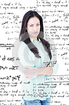 Composite image of serious woman looking at camera
