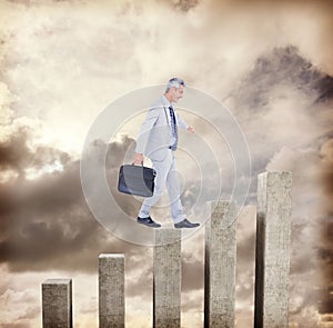 Composite image of side view of businessman walking with briefcase over white background