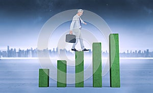 Composite image of side view of businessman walking with briefcase over white background