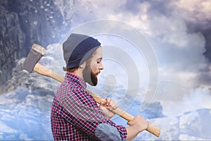 Composite image of side view of hipster with axe