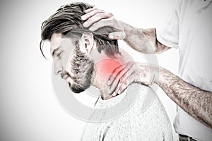 Composite image of side view of a man getting the neck adjustment done