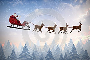 Composite image of side view of santa claus riding on sleigh during christmas