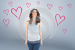 Composite image of smiling beautiful brunette posing