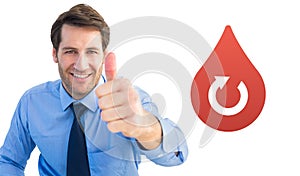 Composite image of smiling businessman gesturing thumbs up