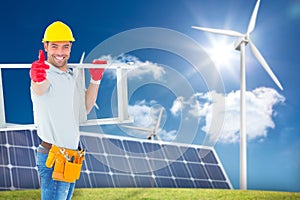 Composite image of smiling handyman carrying ladder while gesturing thumbs up