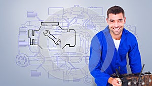 Composite image of smiling male machanic repairing car engine