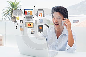 Composite image of smiling man using his laptop and talking on phone