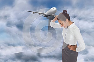 Composite image of smiling thoughtful businesswoman